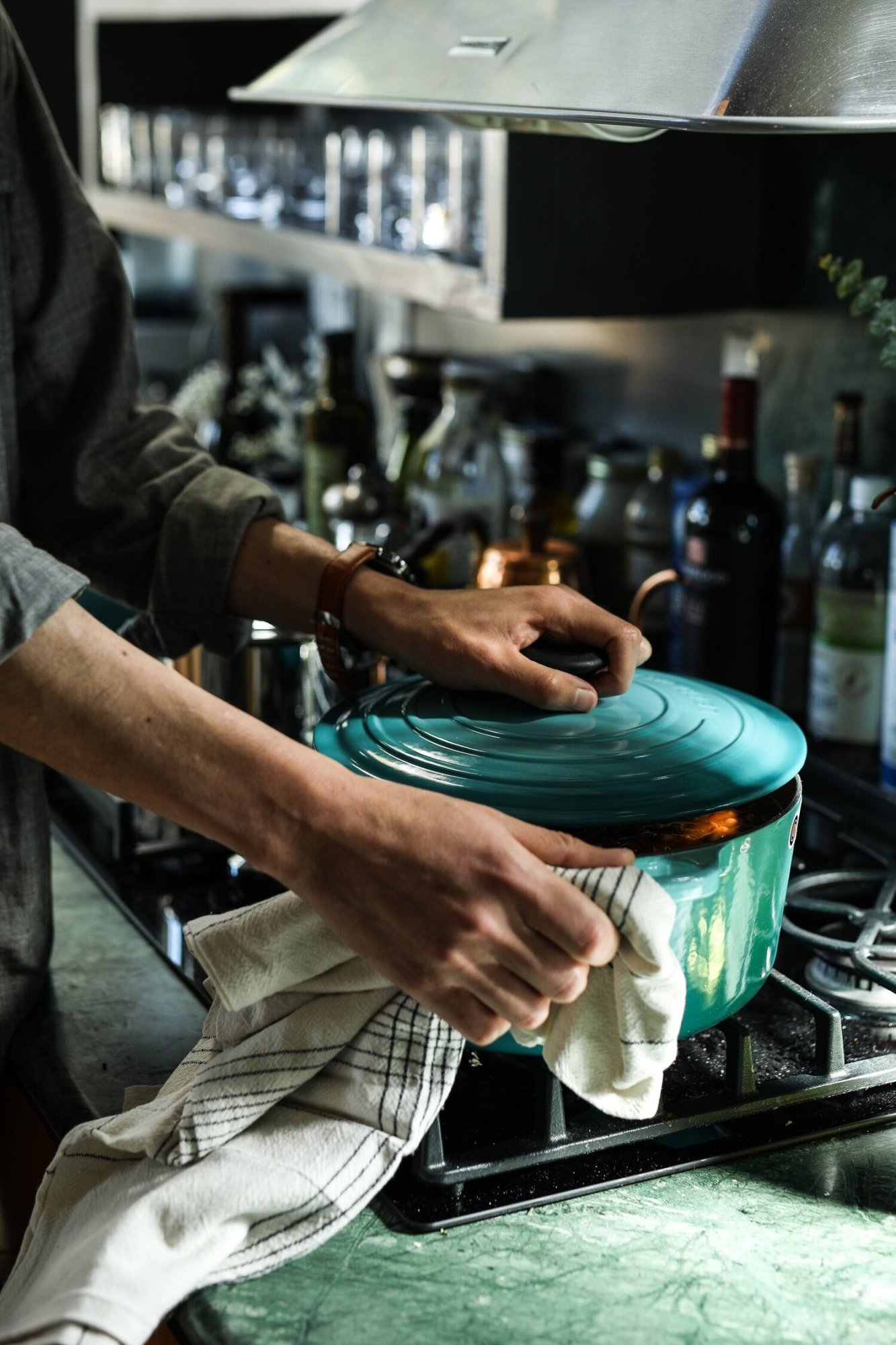edgar-castrejon-s6BrlKXy7e0-unsplash a man preparing food in a kitchen