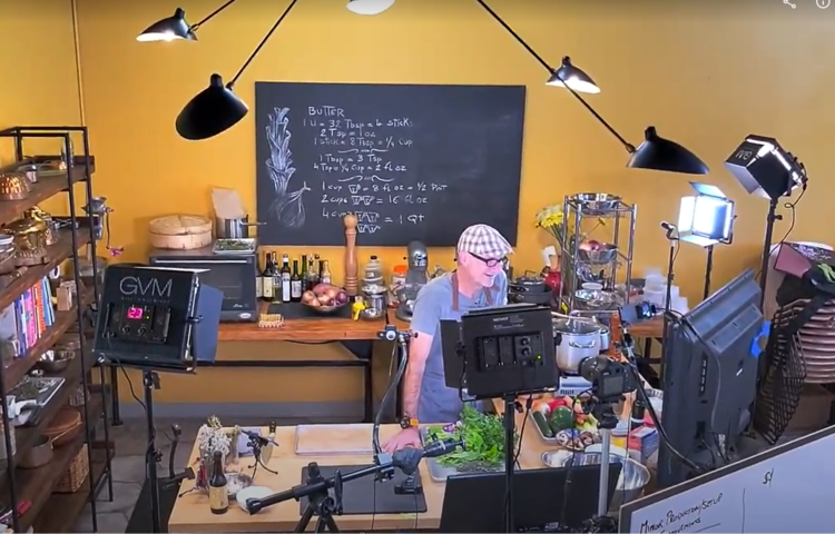 a desk with a computer on a table