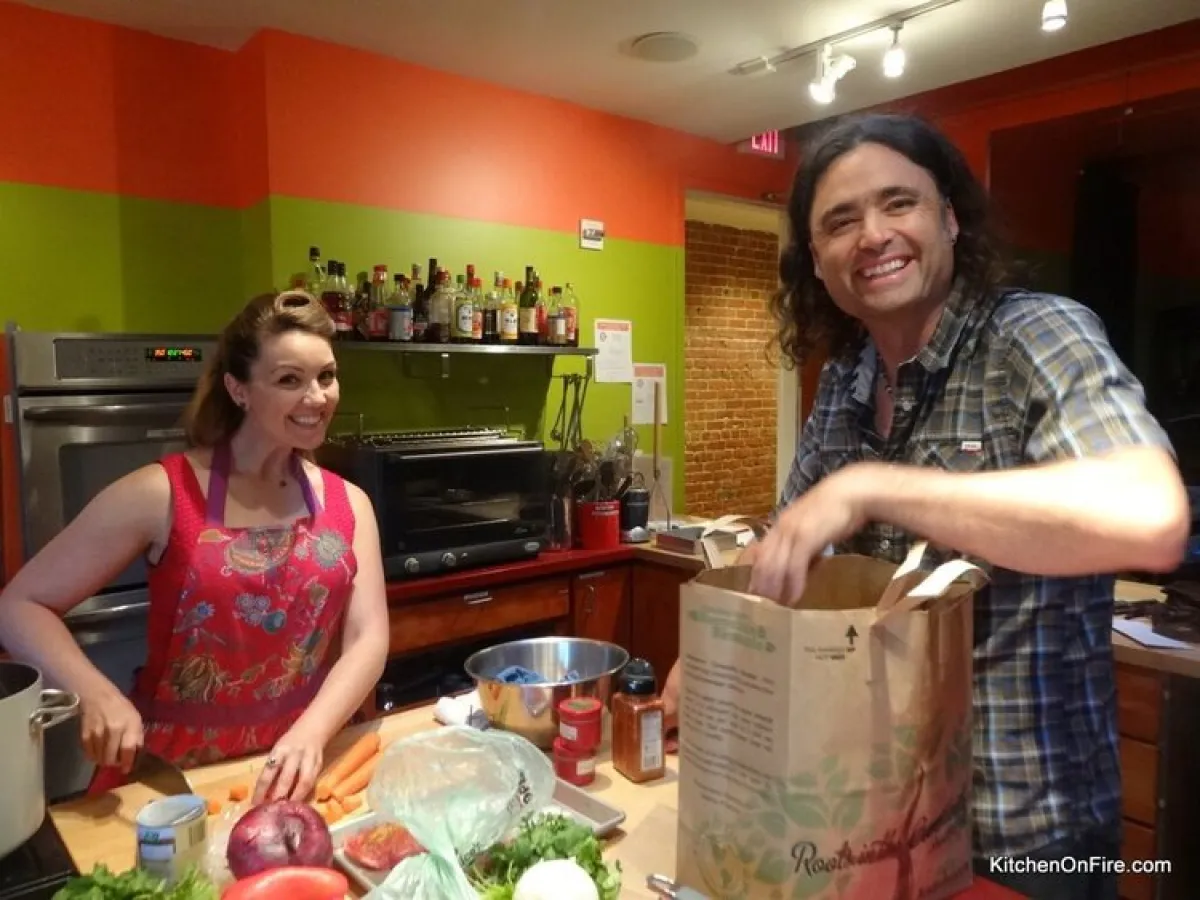 a woman preparing food in a kitchen