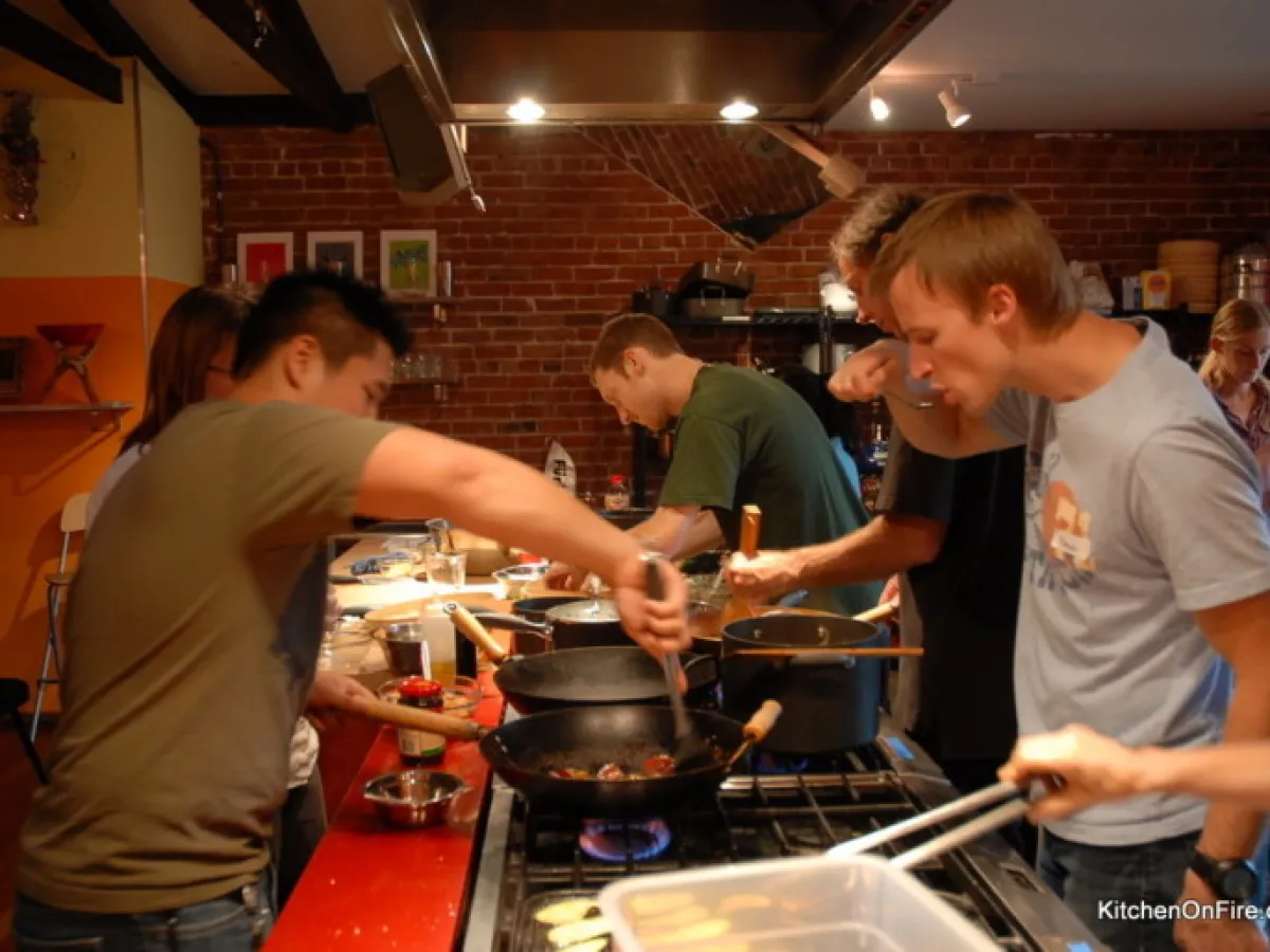 a person cooking in a kitchen preparing food