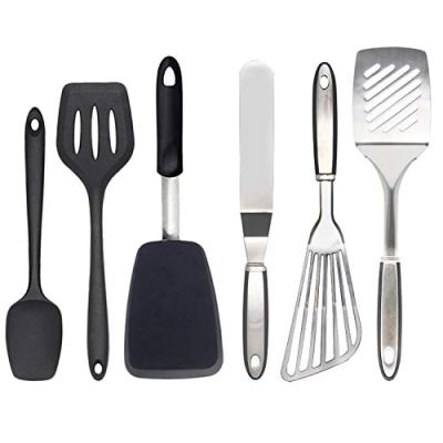 a row of wine glasses on a table