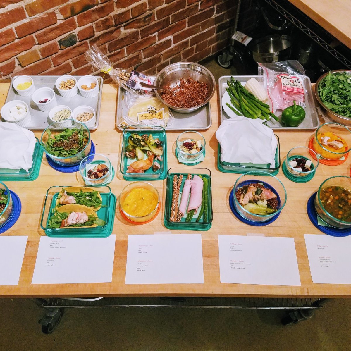 a close up of many different types of food on a table