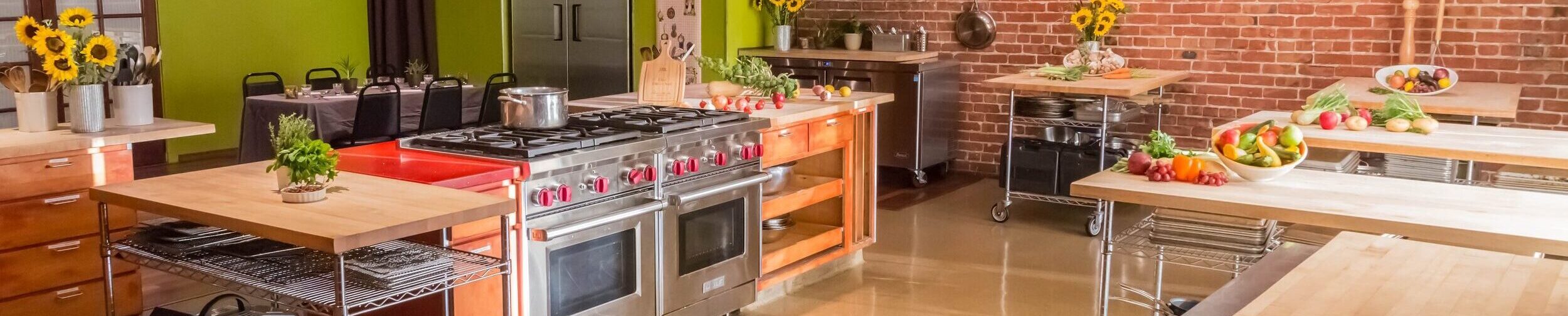 a kitchen with a table in a room
