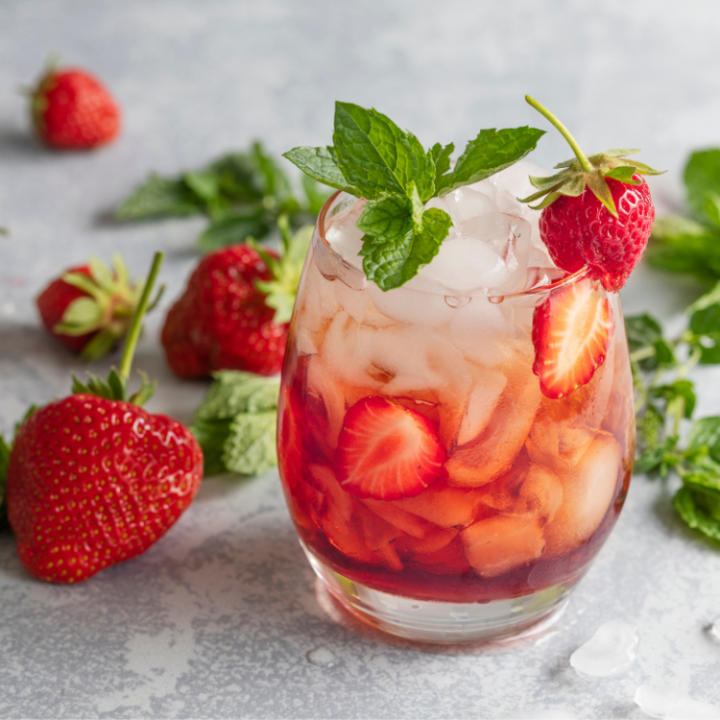 a cake with fruit on top of a table