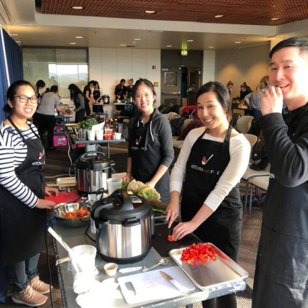 a group of people standing in a room
