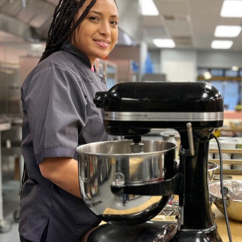 Ansarys standing next to Kitchen Aid mixer