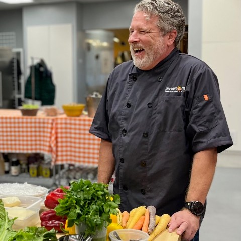 a man preparing food inside of it