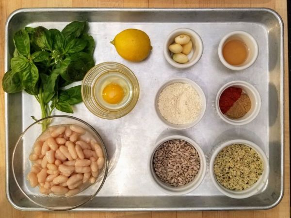 a bowl filled with different types of food on a tray